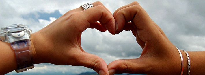 Heart with girl hand Facebook Covers